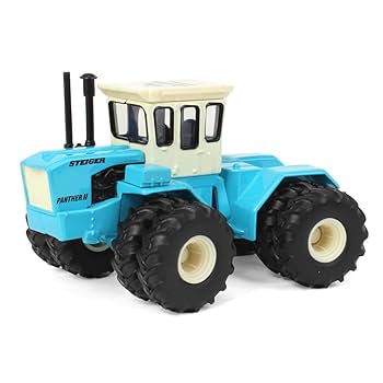 Amazon.com: ERTL 1/64 Case IH & IH 4WD 3 Tractor Set, Toy